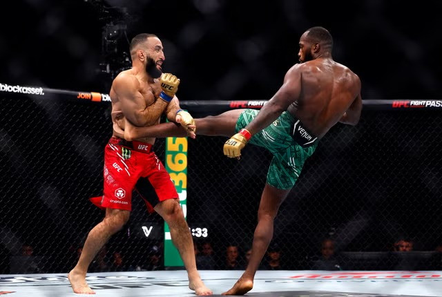 Leon Edwards kicks Belal Muhammad. PHOTO: REUTERS